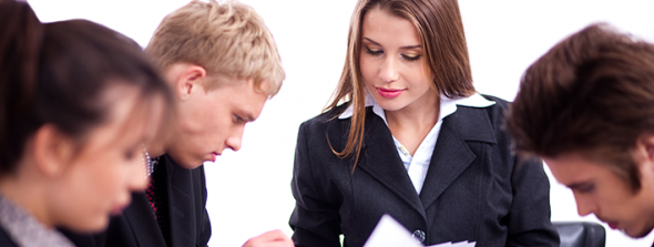 People in a team building exercise People in a team building exercise